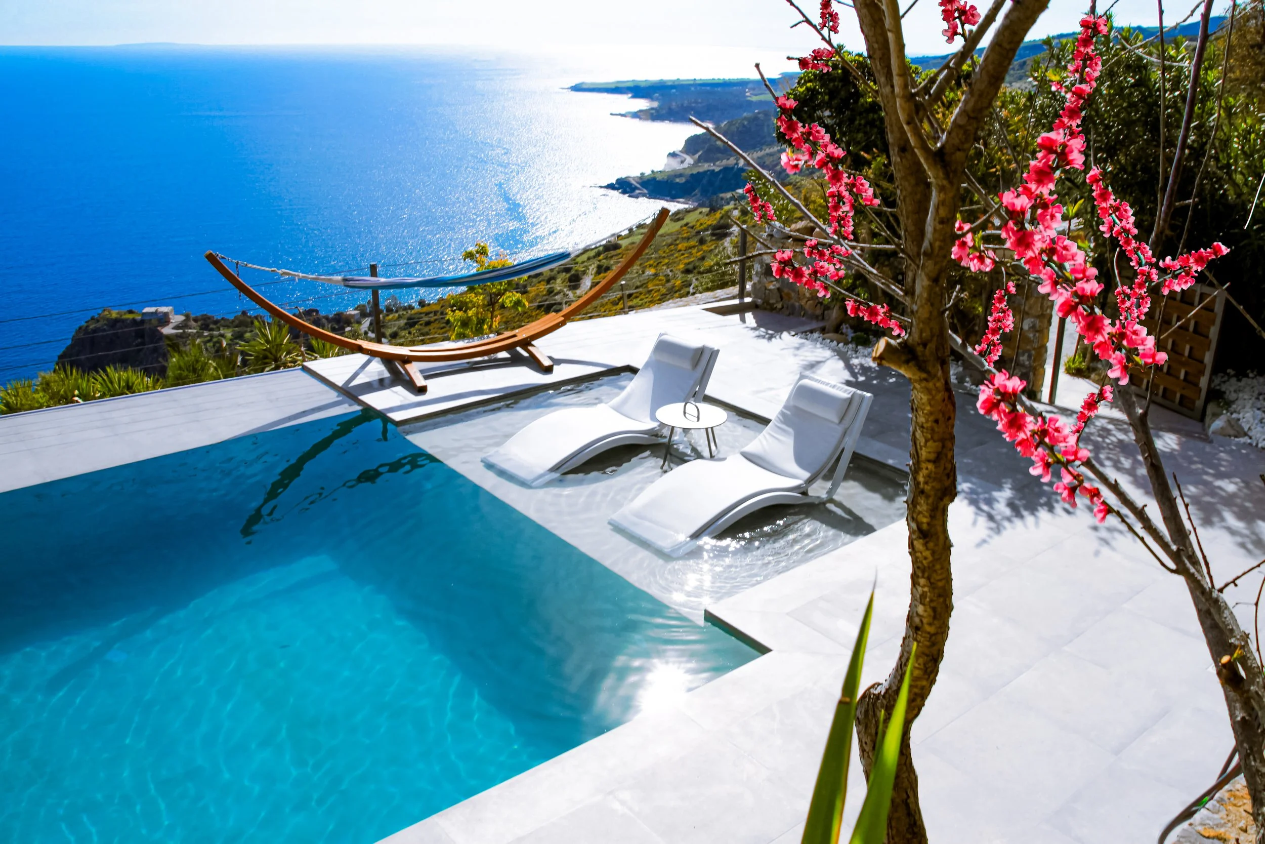 The pool and terrace above the sea